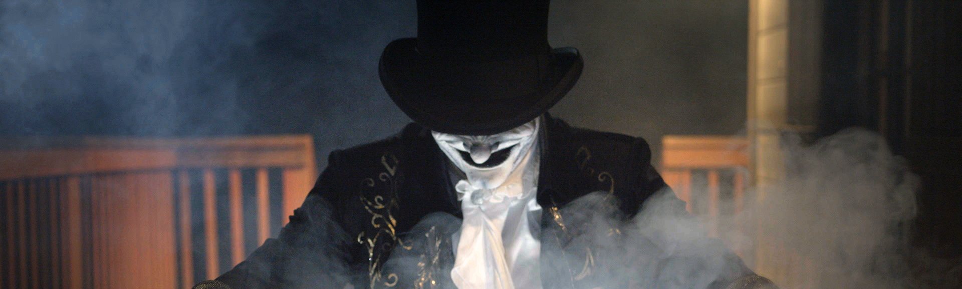 Ringmaster Vincent Vile in his top hat, surrounded by smoke